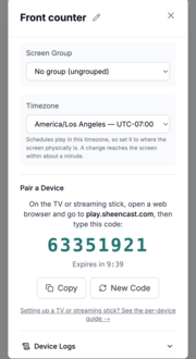 Sheencast on a phone: the settings for a screen called Front counter, showing play.sheencast.com and an eight-digit pairing code with a ten-minute countdown